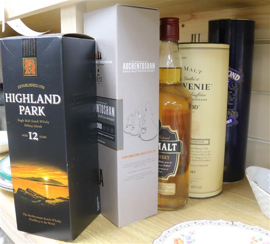 Five assorted bottles of whisky: Highland Park 12yo, Auchentoshan Three Wood, Pure Malt, Balvenie